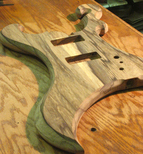 Front of the seven string guitar after carving