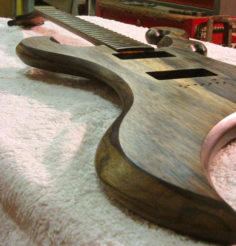 Arm bevel of the guitar from a low angle