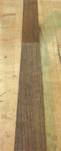 The back of the custom guitar's black walnut neck blank