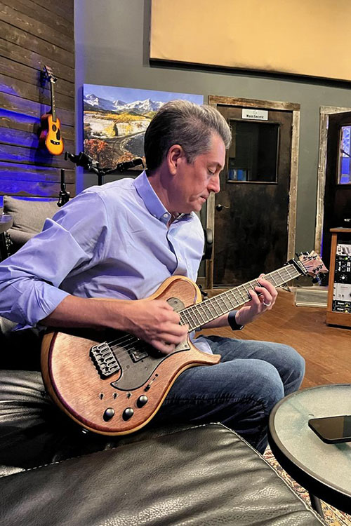 Nathan Wickett in the studio with his Xylem Orianna guitar